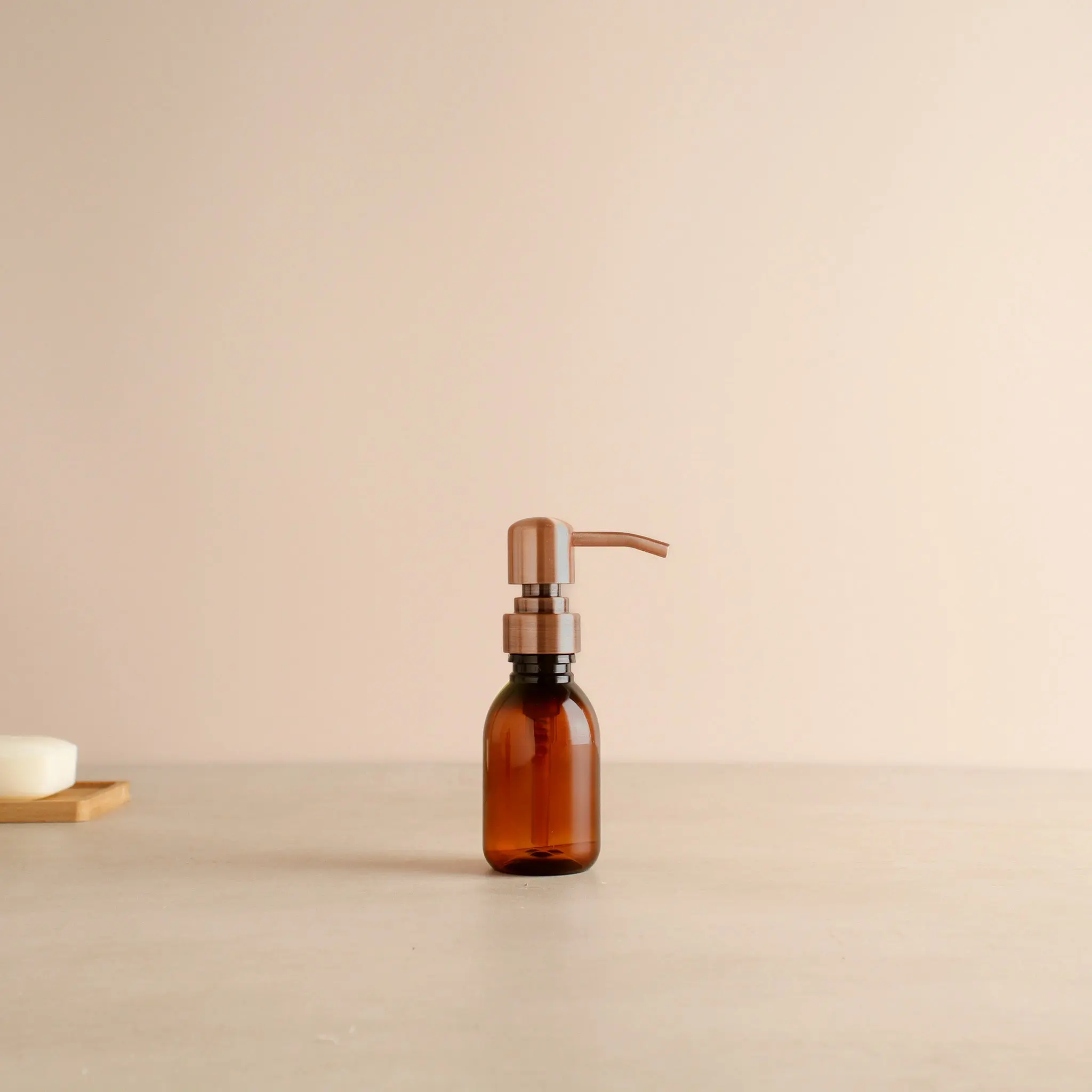 Amber Plastic Dispenser Bottle With Rose Gold Pump - Image 6