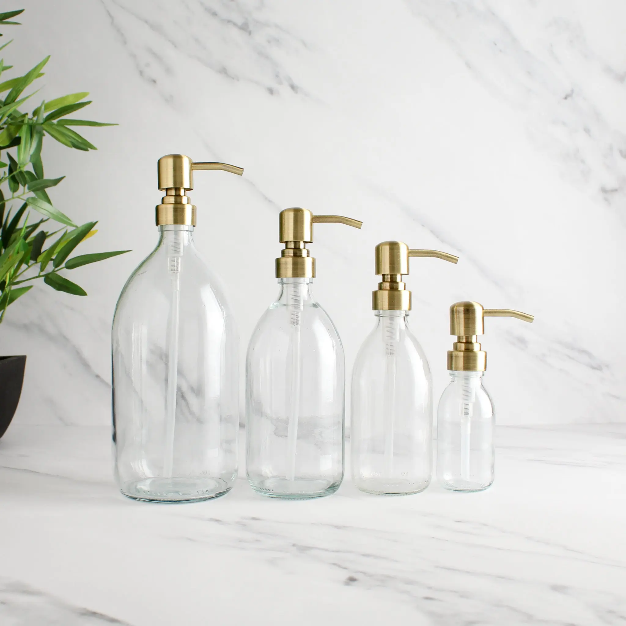 Clear Glass Dispenser Bottle With Gold Pump - Image 2