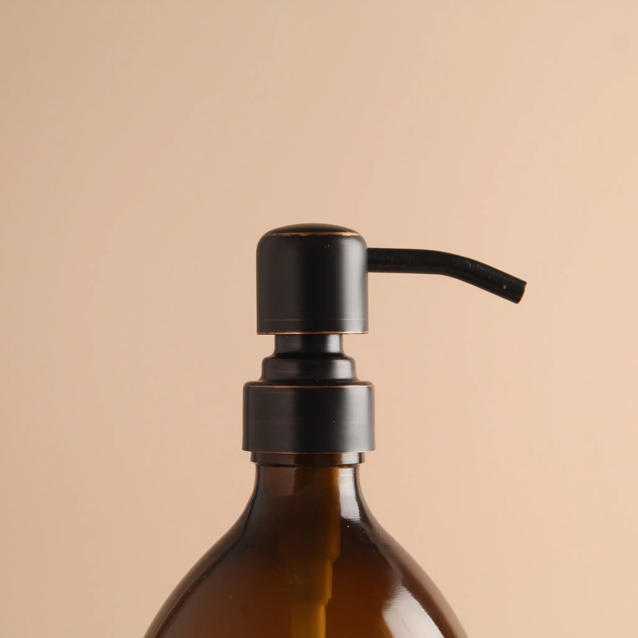 Labelled Amber Plastic Dispenser Bottle With Black/Copper Pump - Image 6