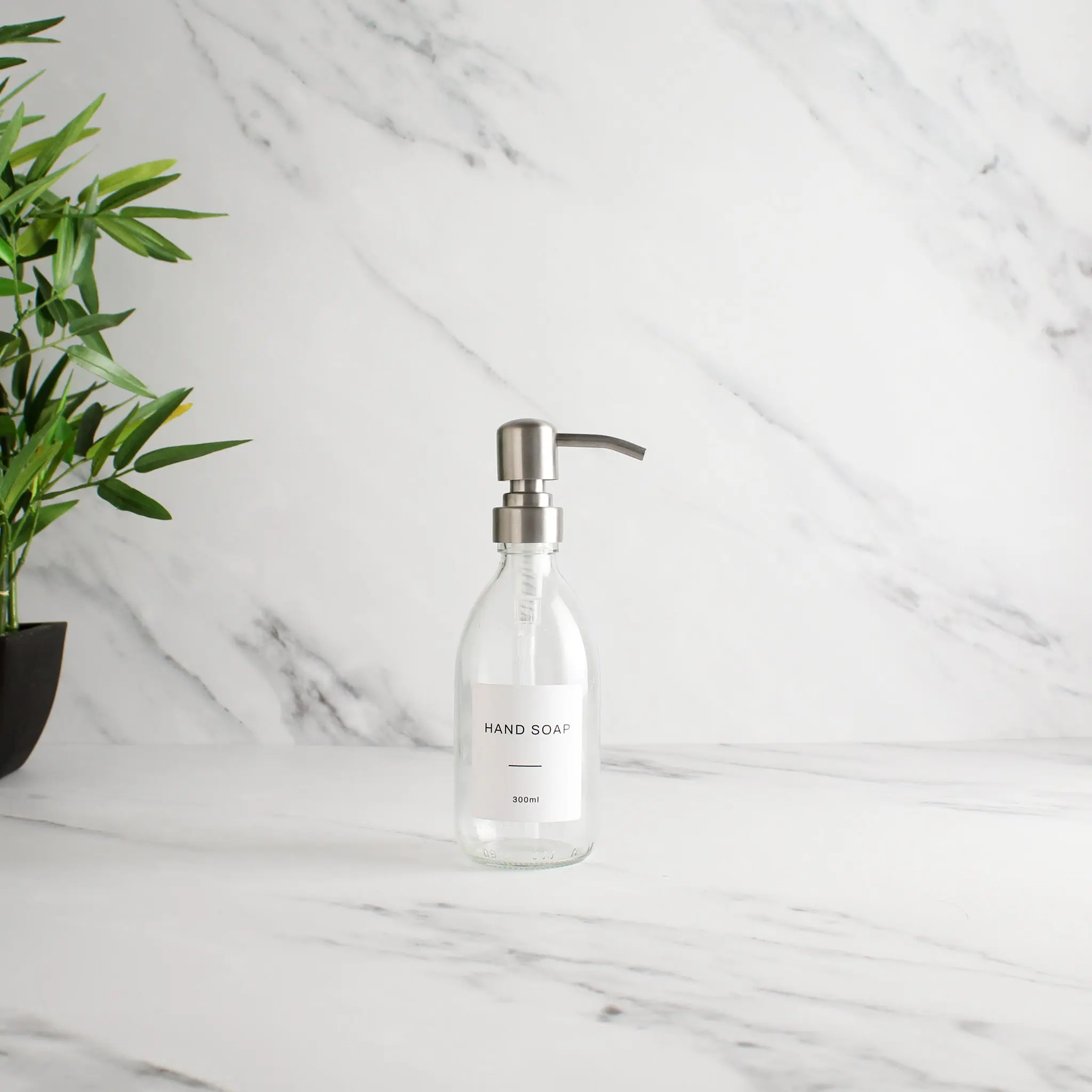 Labelled Clear Glass Dispenser Bottle With Silver Pump - Image 5