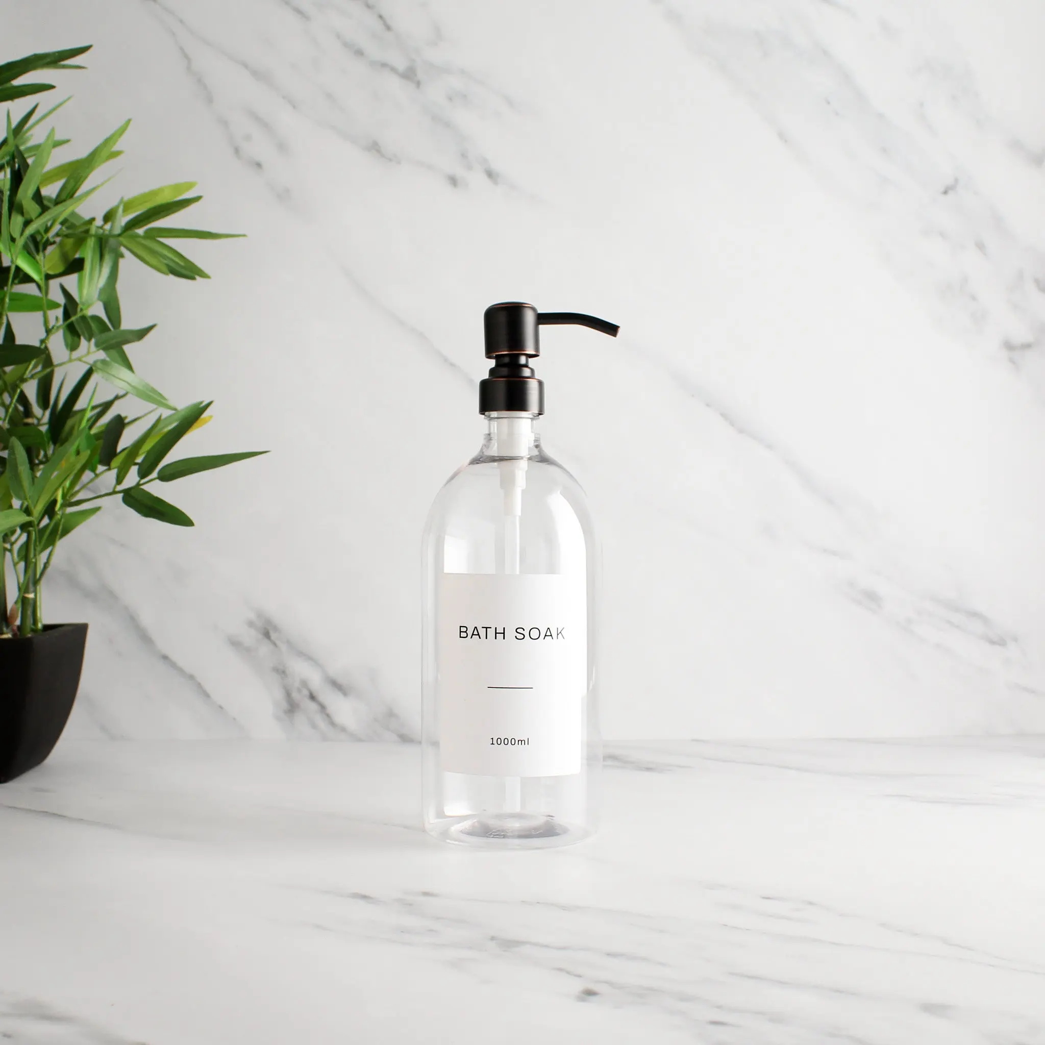 Labelled Clear Plastic Dispenser Bottle With Black/Copper Pump - Image 2