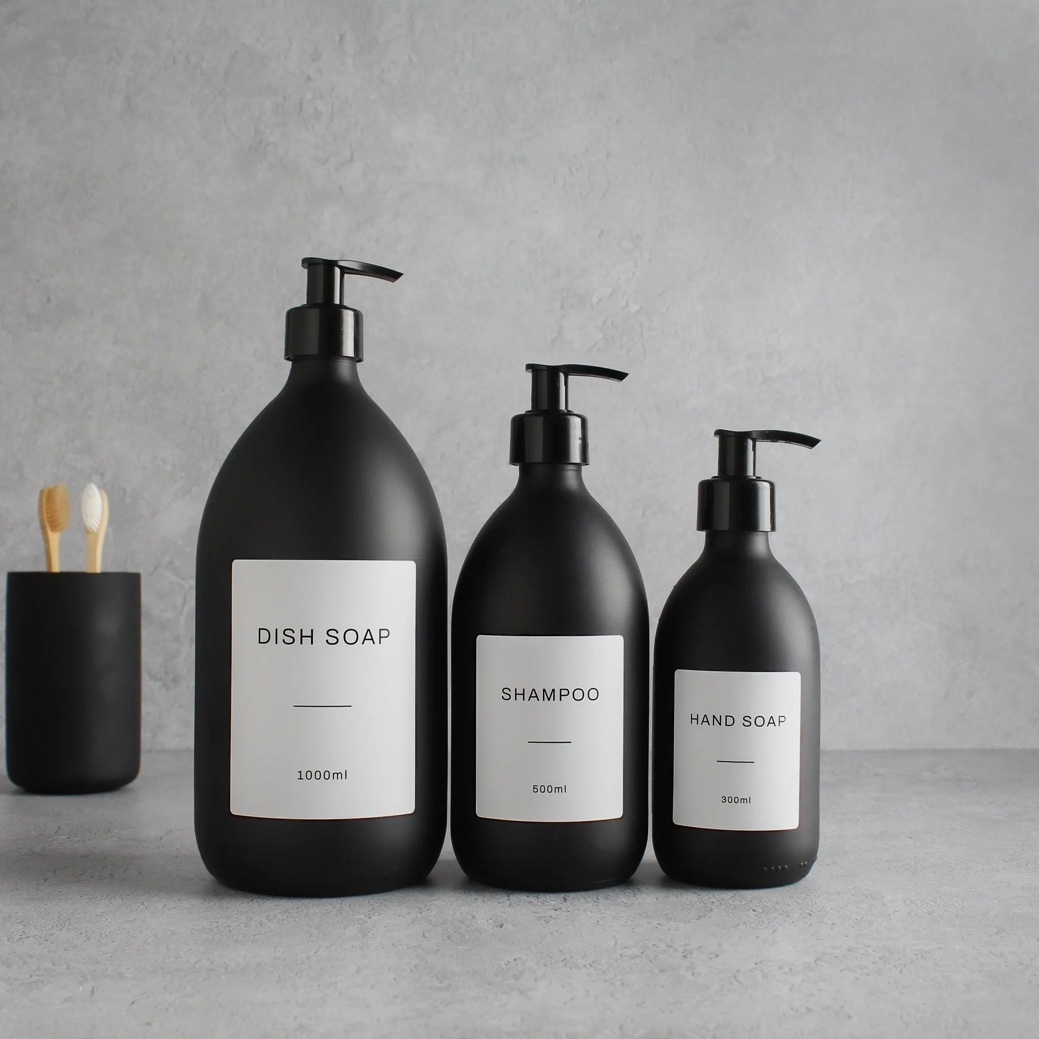 Labelled Matte Black Glass Dispenser Bottle With Black Pump - Image 2