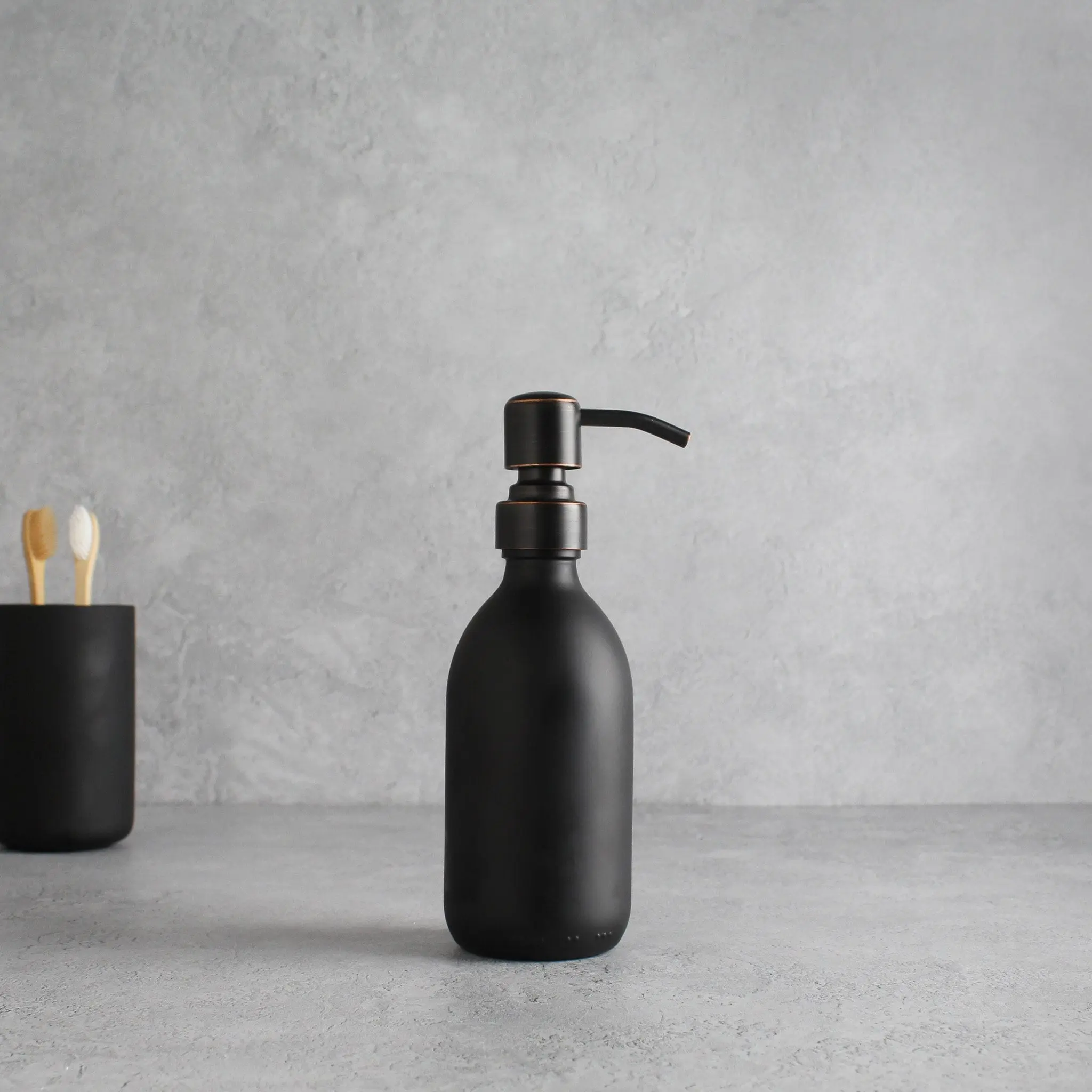 Matte Black Glass Dispenser Bottle With Black/Copper Pump - Image 5